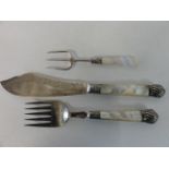 Three pieces of vintage cutlery one with a silver collar