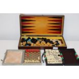 Three boxed gaming sets chess etc