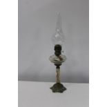 A antique brass & glass oil lamp 60cm tall