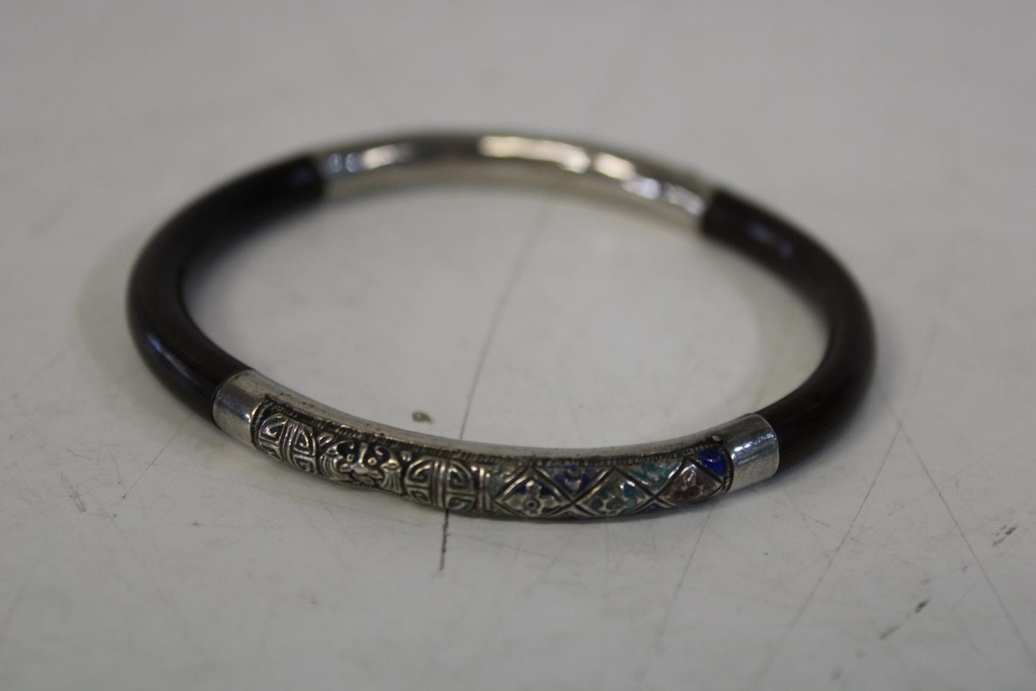 A Chinese silver & wooden bangle