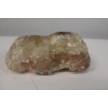 A lump of quartz 16cm x 10cm. Weighs 1.5 kg