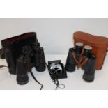 Three sets of binoculars