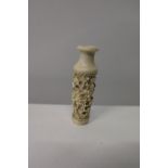 A vintage carved ivory bottle. 8cm tall