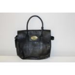 A black leather Mullberry marked hand bag