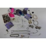 A box of costume beads & accessories