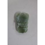 A Chinese jade buckle 7.5cm long