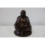 A wooden figure of Buddha h21cm