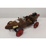 A vintage handmade wooden car model