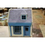 A vintage wooden dolls house 46x40