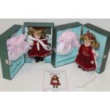 Two boxed Atlas collectors dolls