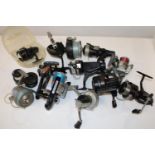 A box full of assorted vintage fishing reels