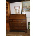 A quality George III oak bureau circa 1770 (needs attention to the interior pieces are present)