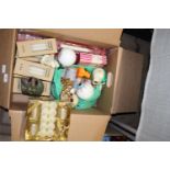 A box of assorted new candles etc