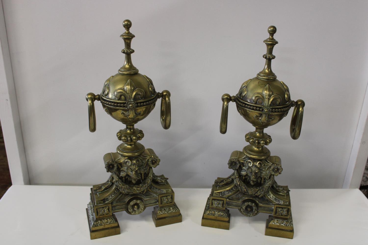 A pair of mid Victorian heavy brass fire dogs 57cm tall collection only