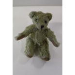 A small vintage teddy bear h15cm