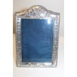 A large hallmarked silver photo frame 24x17cm