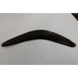 A vintage had carved Australian boomerang