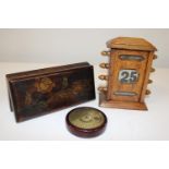 A selection of wooden items including a vintage wooden desk calendar