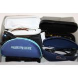 A collection of cased designer sunglasses Nina Ricci,Ralph Lauren, Lambretta, Fila,Quay