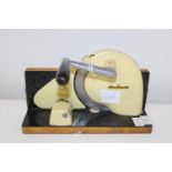 A vintage mid century meat slicer