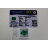 A emerald gemstone with cert