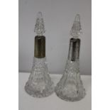 A pair of hallmarked silver collared & hobnail cut glass scent bottles. Chester marks for 1913