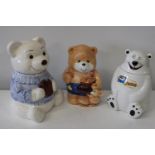 Three teddy bear themed biscuit barrels 30cm tall