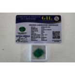 A emerald gemstone with cert