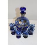 A blue & silver gilt decanter & set of six glasses