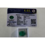 A emerald gemstone with cert