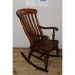 A vintage elm rocking chair collection only