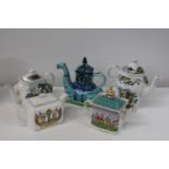 A group of collectable teapots