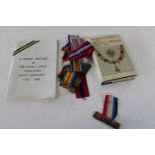 A job lot of medal ribbons and military related books