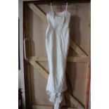 A wedding dress Roland Joyce size 10