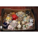 A box full of assorted ceramic teapots collection only