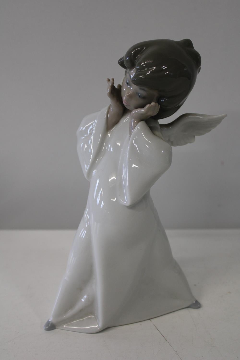A Lladro figurine 23cm tall