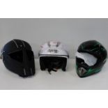 Three assorted new sports helmets