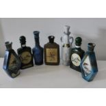 A job lot of vintage ceramic liquor bottles