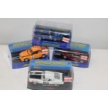 Four boxed Scalextric cars