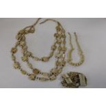 A selection of vintage bone jewellery etc