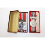 A bronze long service British Fire Service Association medal and a hallmarked silver version for