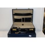 A boxed as new BNIB Mappin & Webb leather briefcase