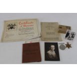 A selection of WW2 militaria awarded to a Harold Mitcham army No 272590