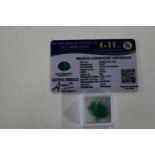 A emerald gemstone with cert