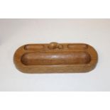 An unusual & rare Robert 'Mouseman' Thompson of Kilburn pen tray/desk tidy with carved mouse to top.