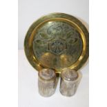 A Islamic themed brass charger & two Indian themed silver on brass cannisters