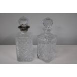 Two cut glass decanters