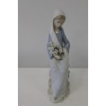 A Lladro figurine 25cm tall