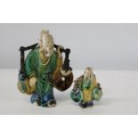 Two Chinese ceramic figures. Tallest is 12cm tall