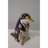 A Royal Crown Derby paper weight in the form of a penguin with gold stopper 22cm tall